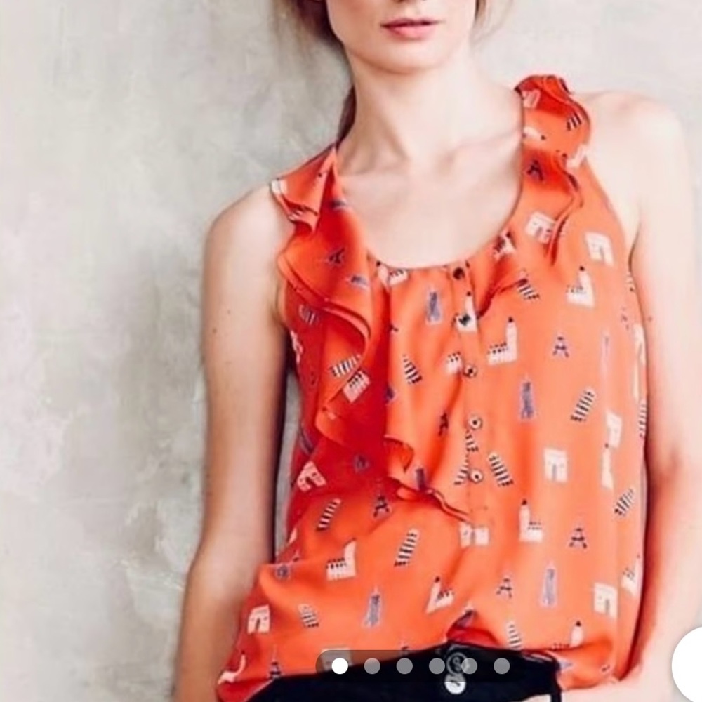 Anthropologie’s Maeve sleeveless with ruffles top.